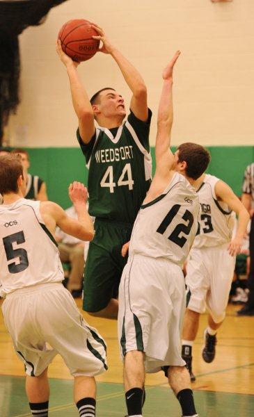 Senior Jake Cook shoots in a recent game against OCS.