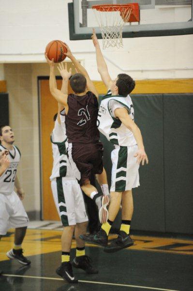 Freshman J.J. O'Connor attempts to block a shot against Port Byron last season.