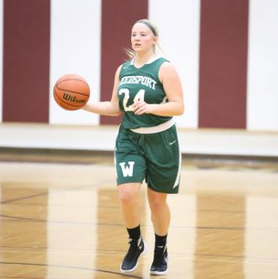 Grace Beardsley brings the ball up-court for the Lady Warriors (Jared Sullivan)